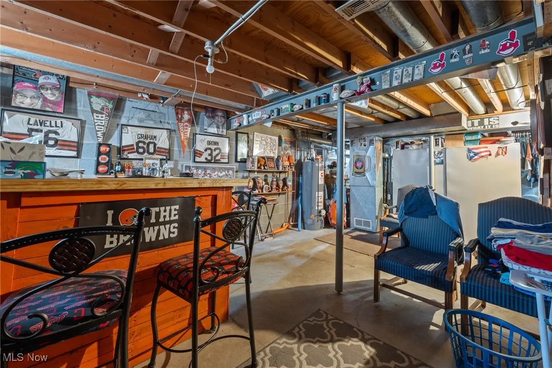 Unfinished basement with gas water heater