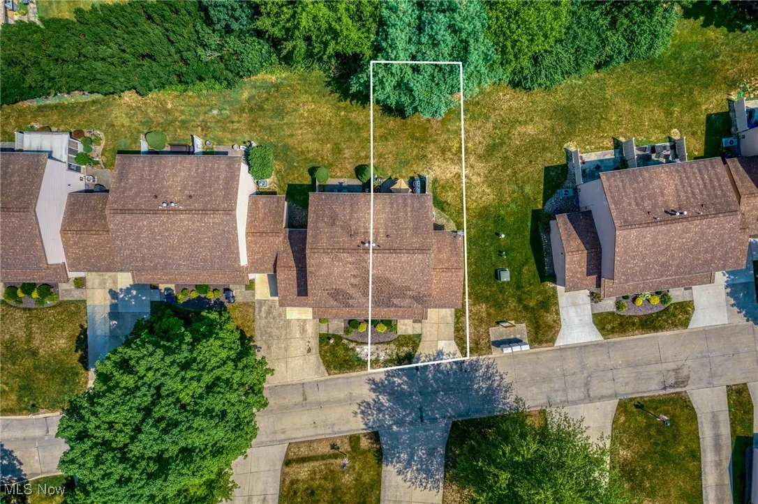 Aerial overview of property's location with property parcel outlined