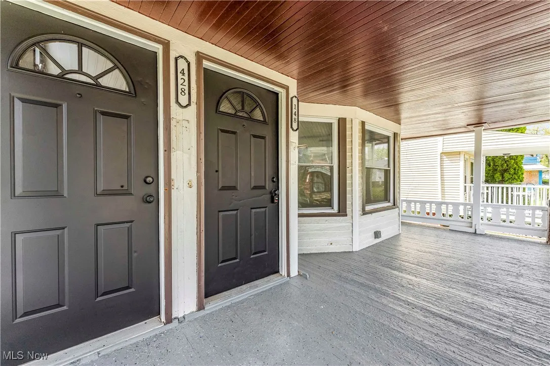 Entrance to property with a porch