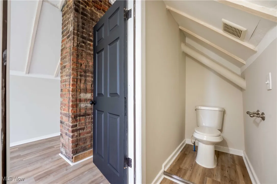 Bathroom with wood finished floors