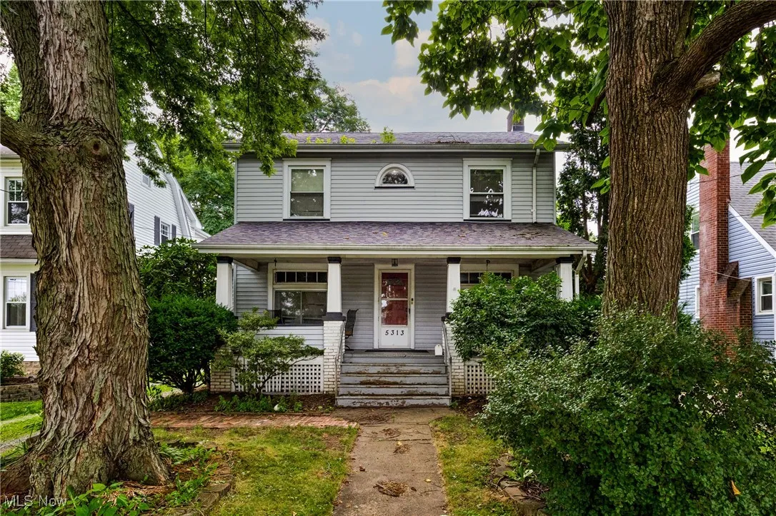 Traditional style home with covered porch