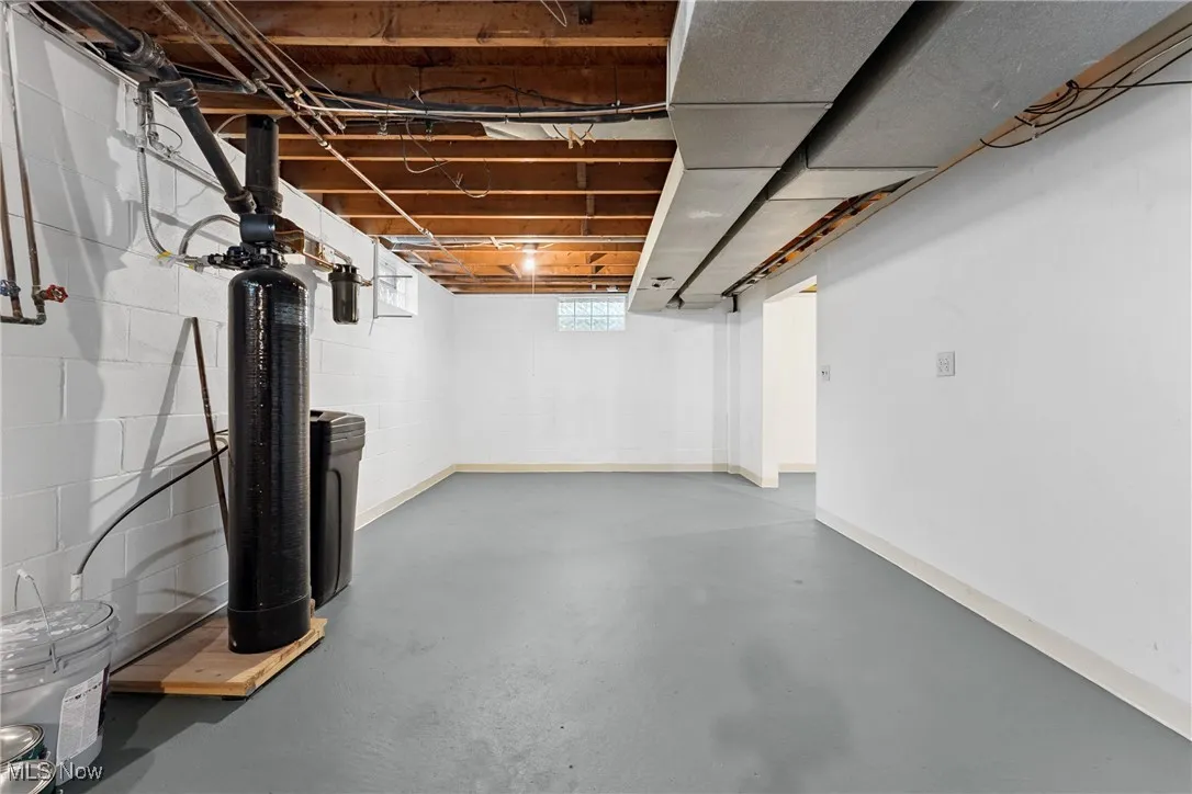 Basement featuring a water softener