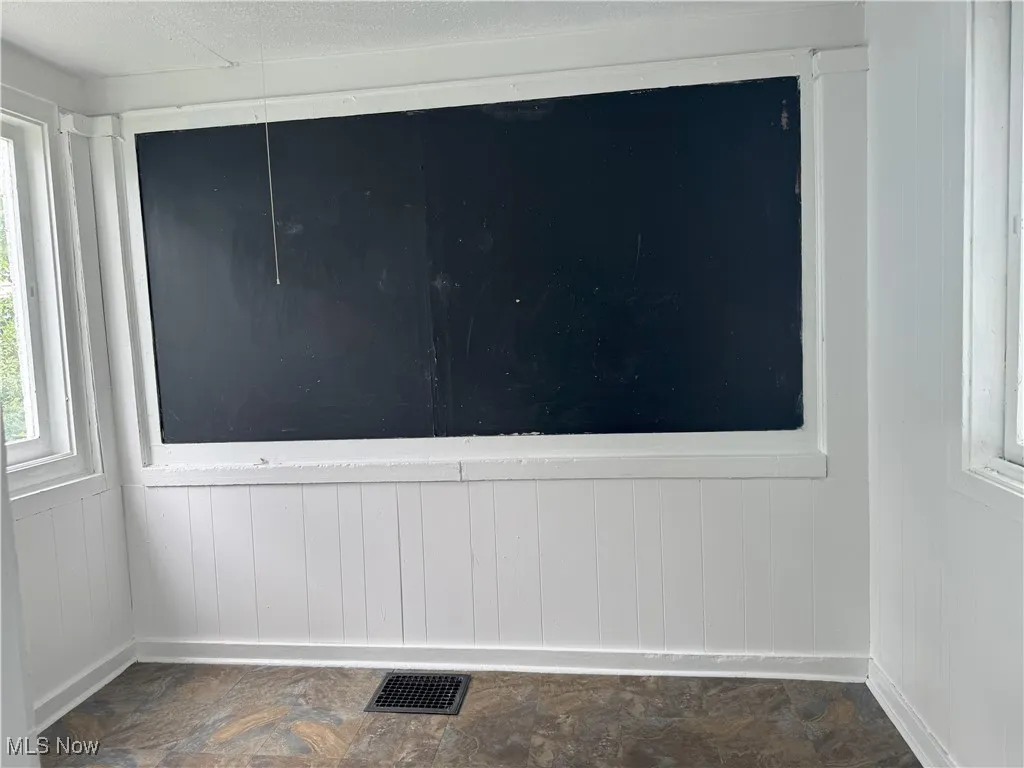Empty room with baseboards