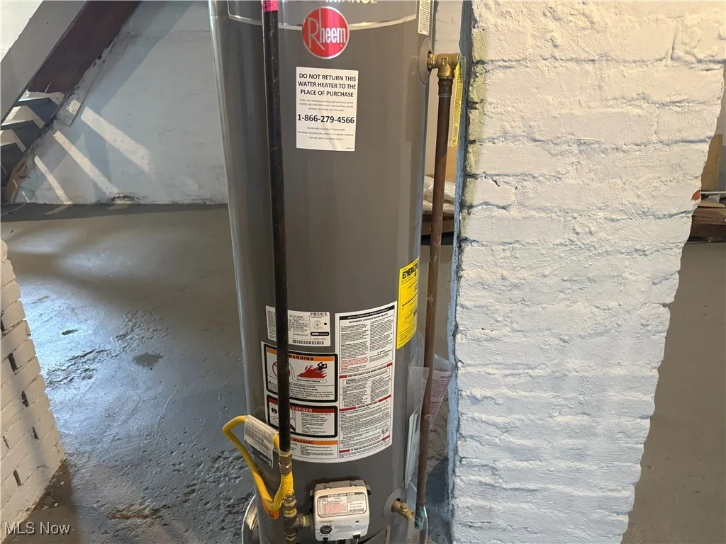 Utility room with gas water heater