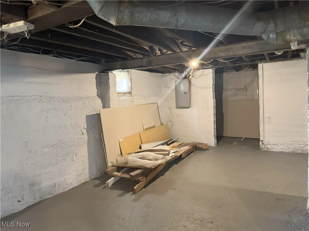 Below grade area with electric panel