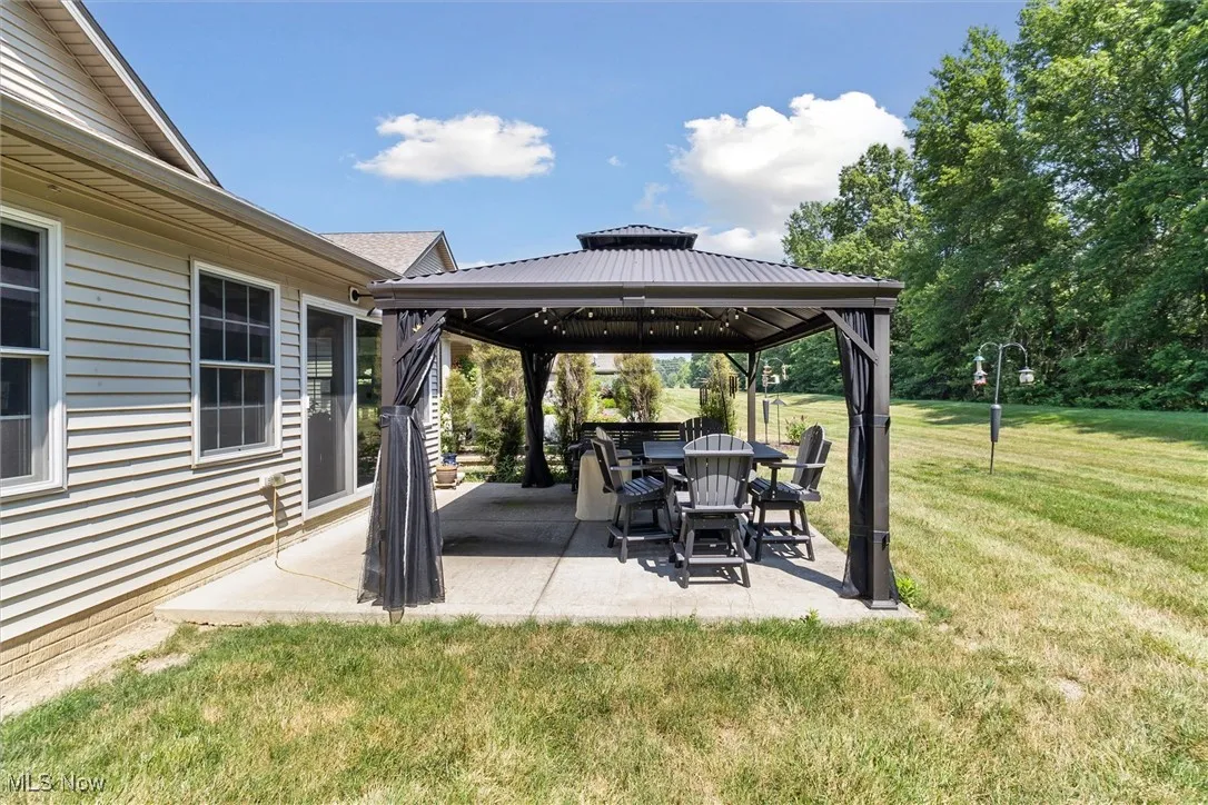View of patio / terrace with a gazebo