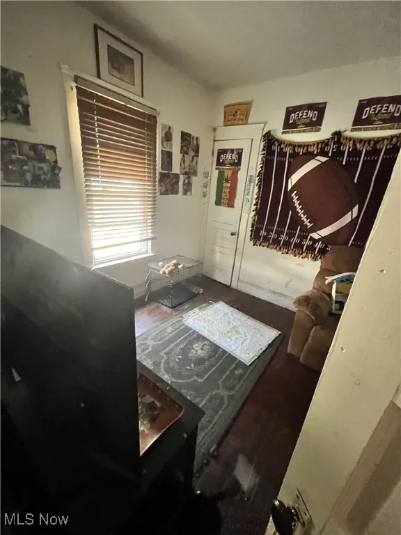 Bedroom with wood finished floors