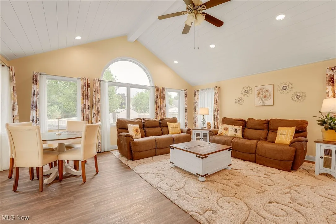 Family room featuring luxuary vinyl floors, a ceiling fan, and recessed led lighting and