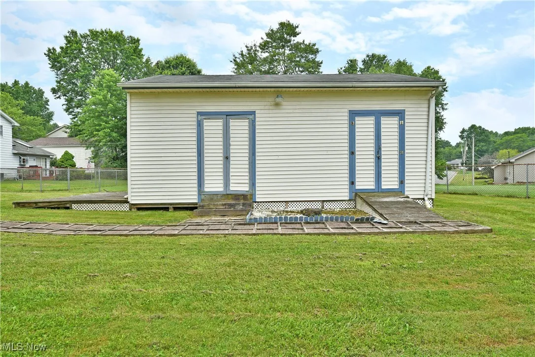 View of outdoor structure with entry steps