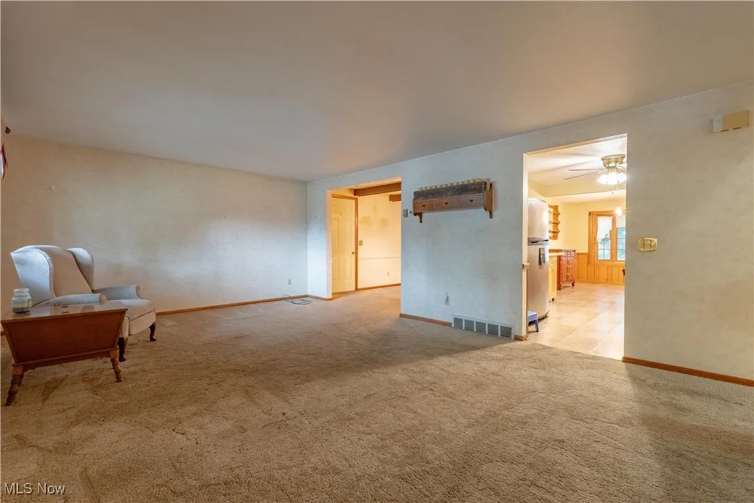looking into kitchen and dining room w/access to garage