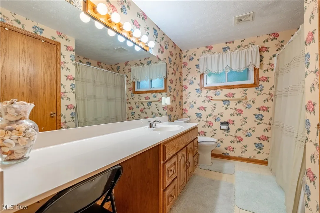 2nd floor full bathroom with extra long vanity and counter top