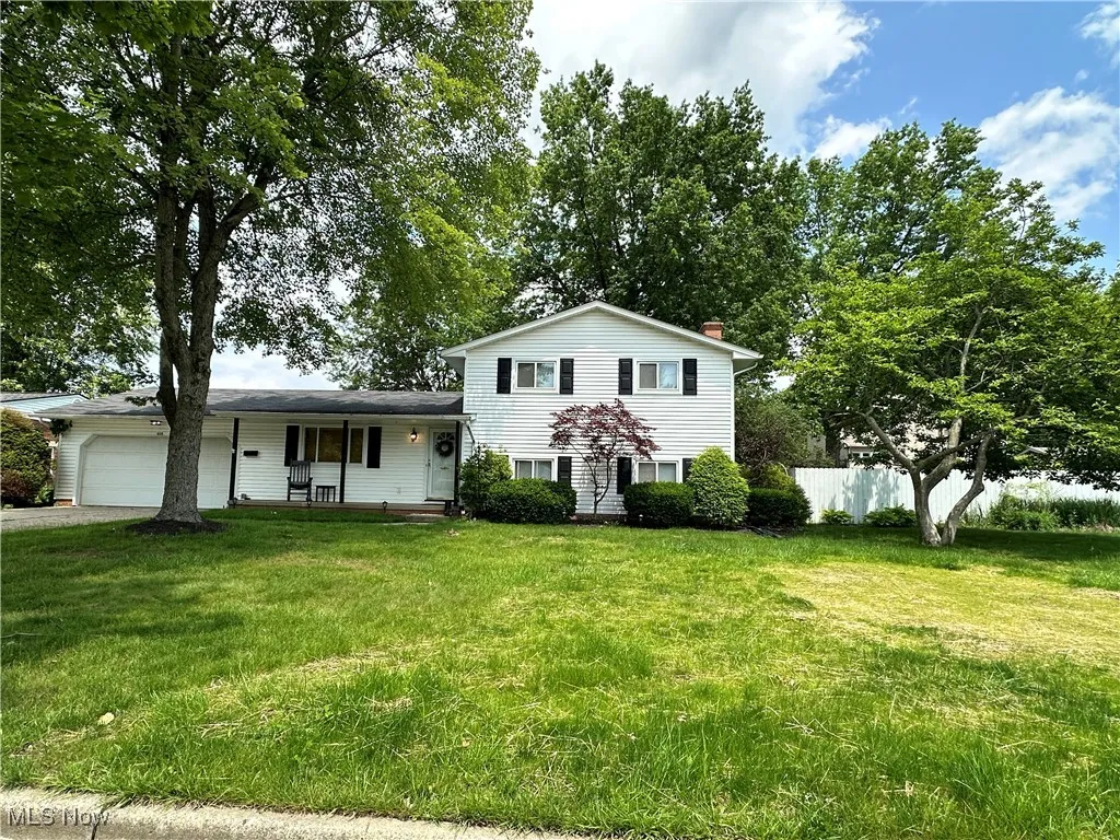 Front of property showing fenced in pool area
