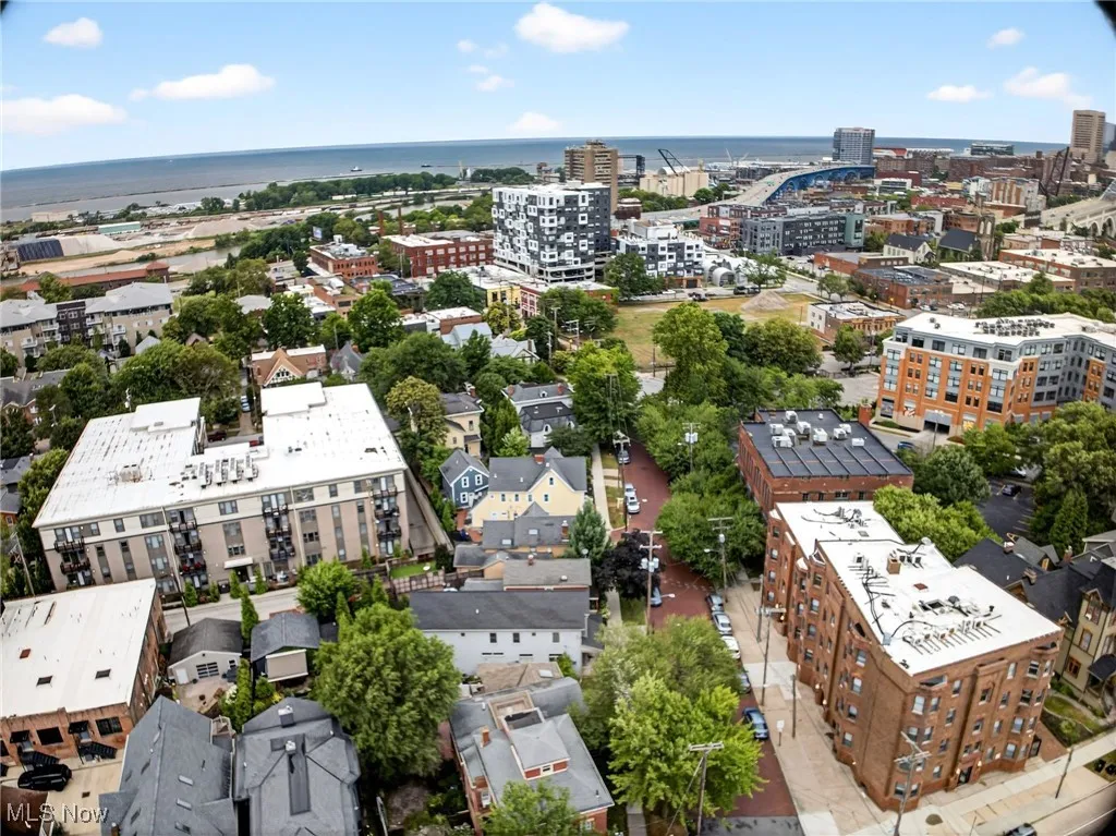 View of urban area featuring a nearby body of water