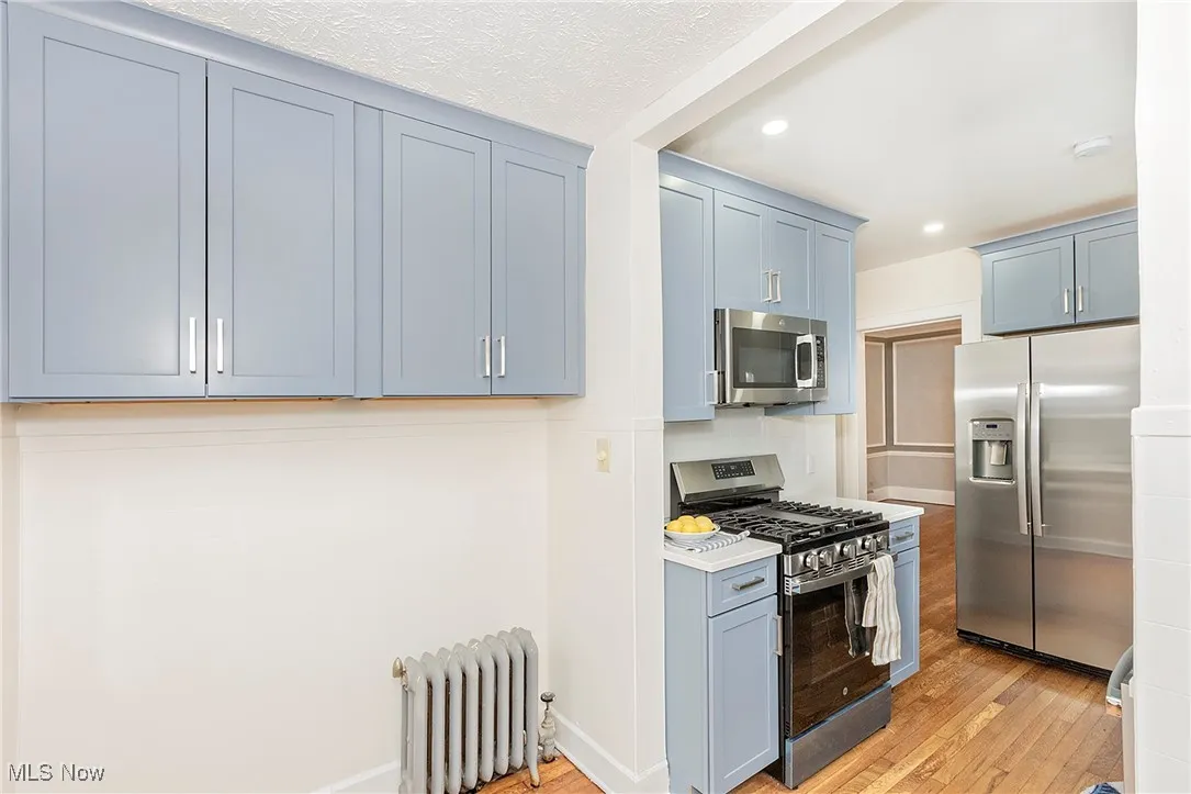Additional wall cabinetry for storage and function