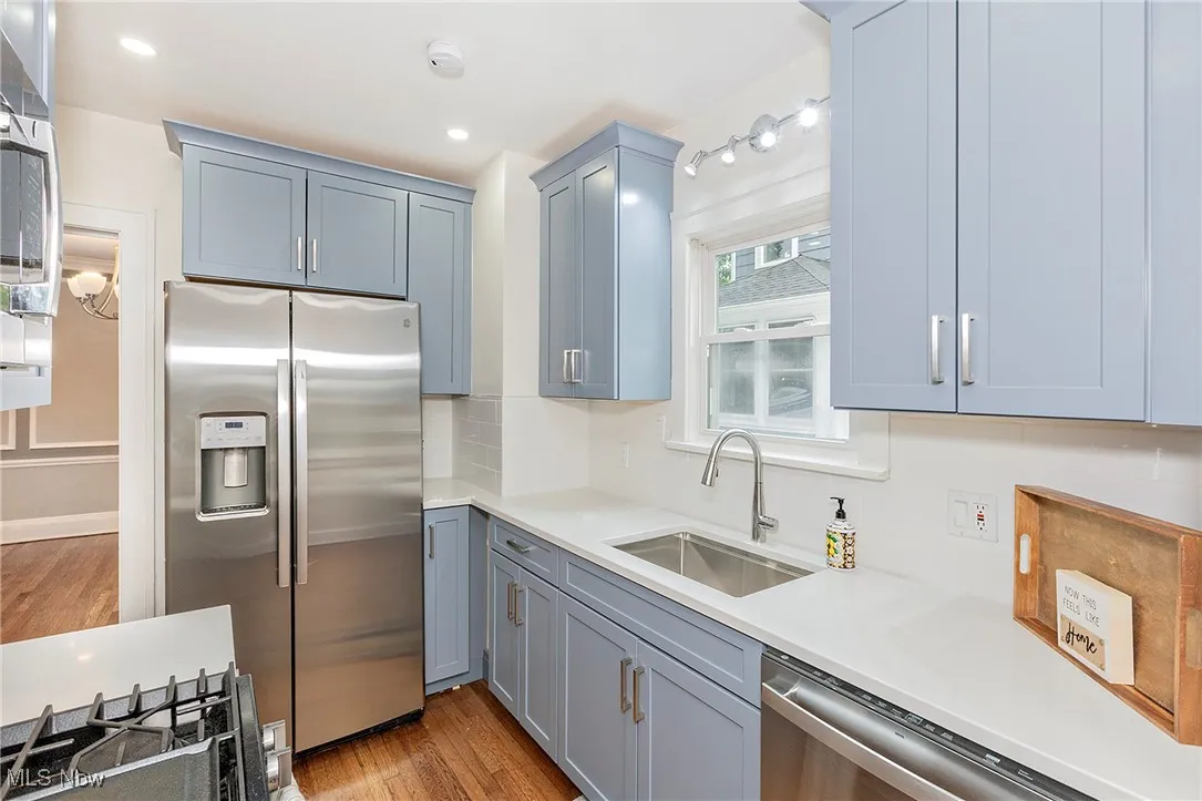 The clean + new quartz countertops are lovely.