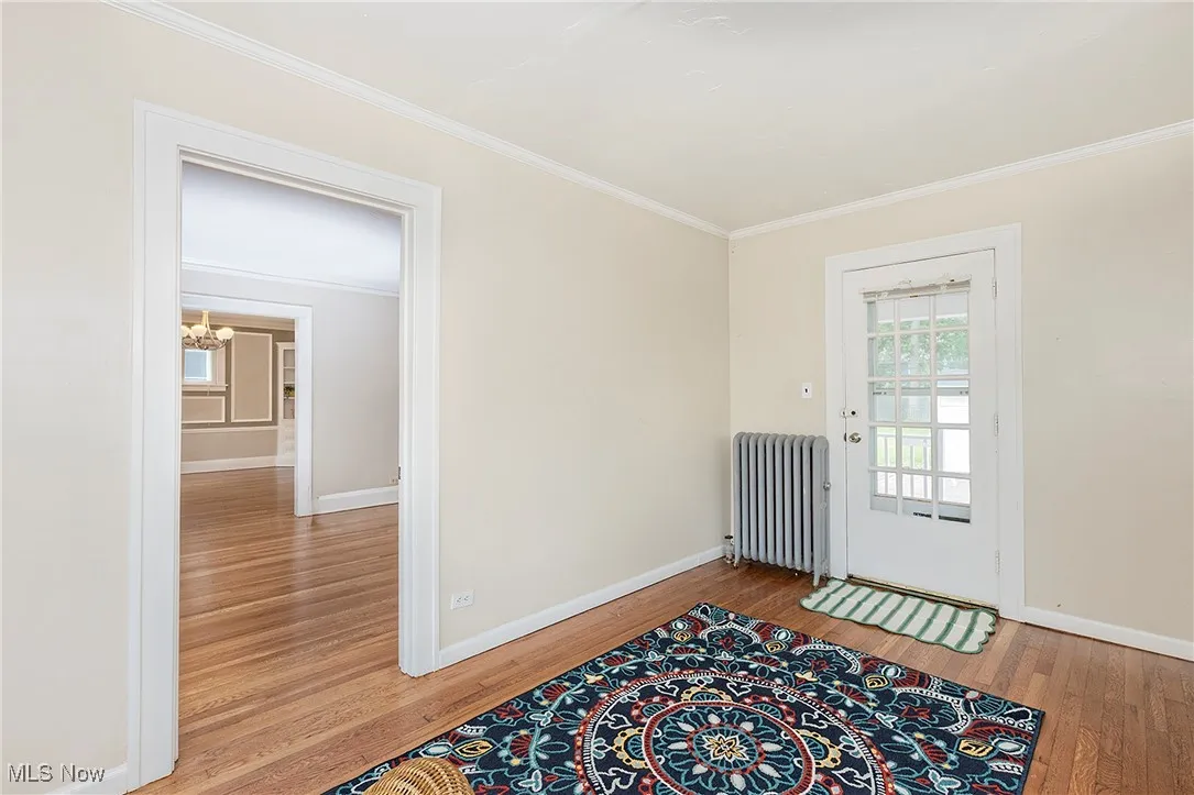 The french door leads to the back porch.