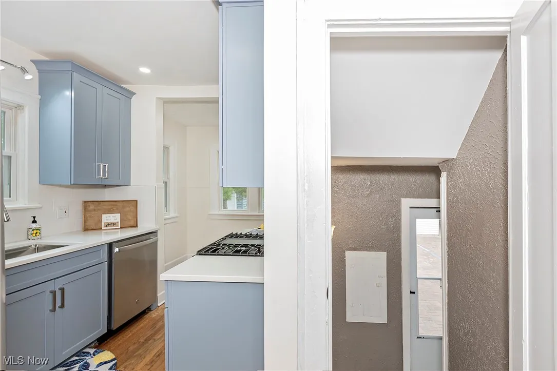 A layout view showing the eat in kitchen on the left and steps to the back door on the right