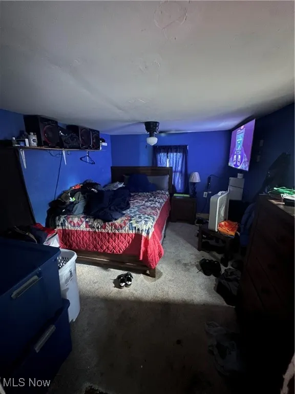 Bedroom featuring carpet flooring