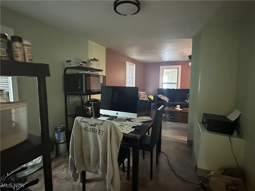 Dining space featuring a ceiling fan