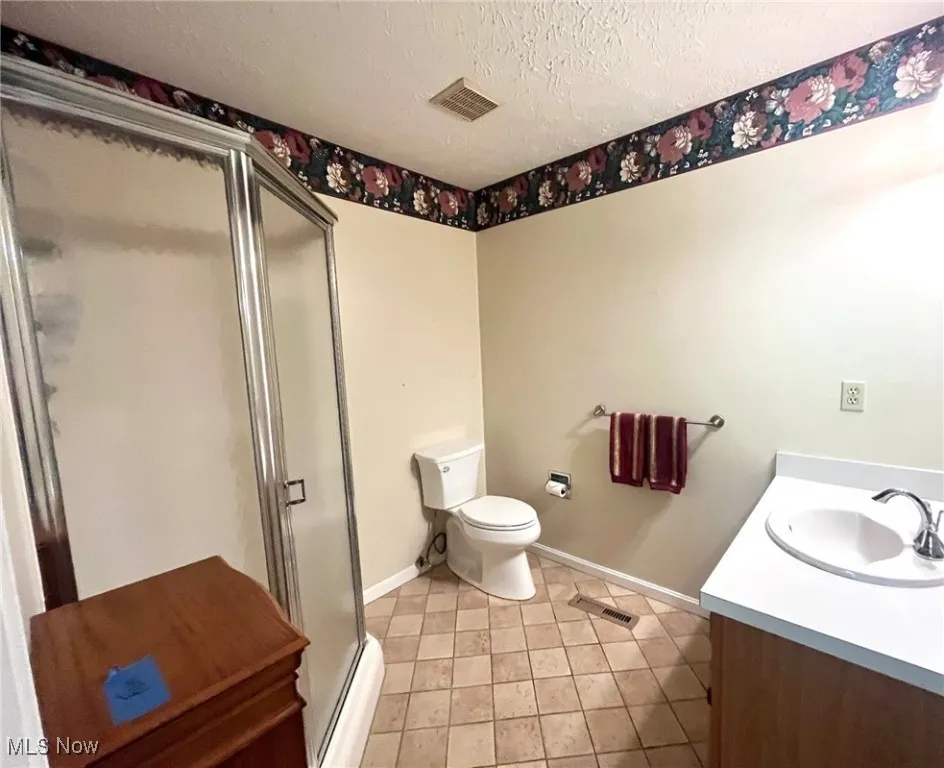 Primary Bathroom with a stall shower