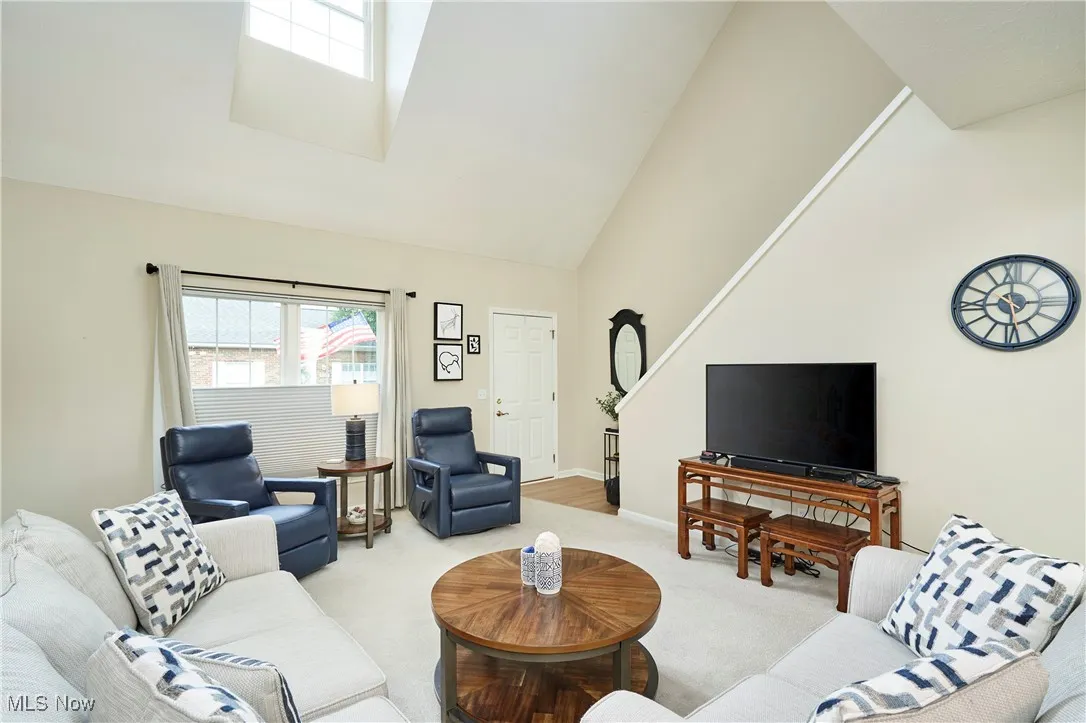 Head back through living room toward the second floor