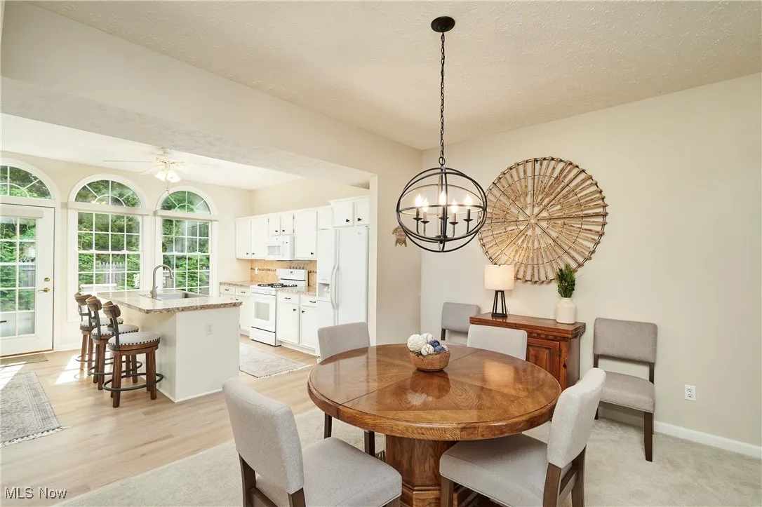 Continue to Dining Area.  Not pictured to left is garage entrance, laundry room, coat closet and powder room.
