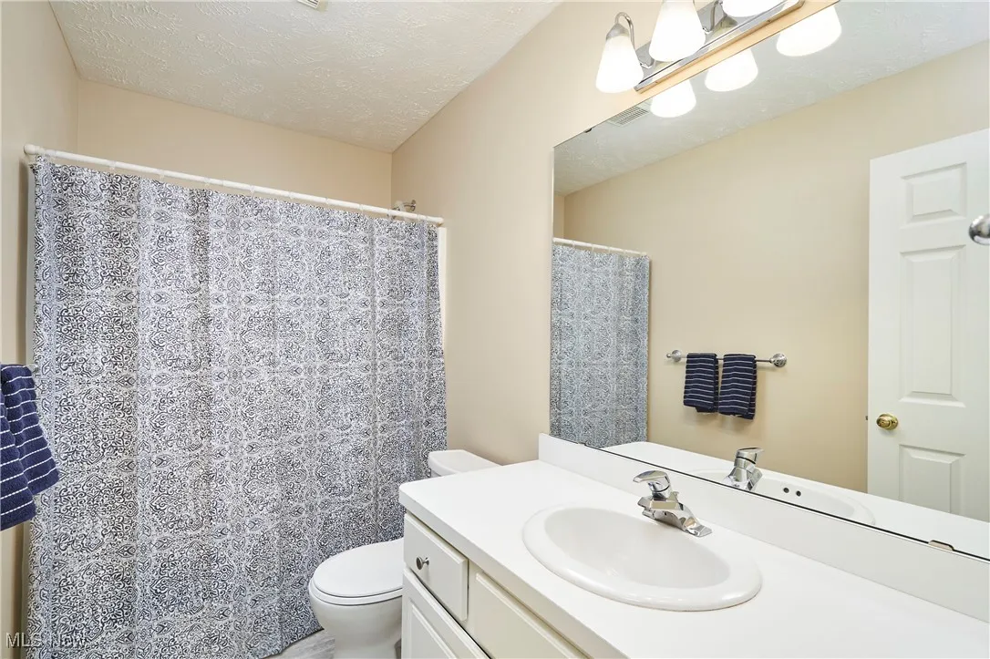 Second floor hall bath (full)
