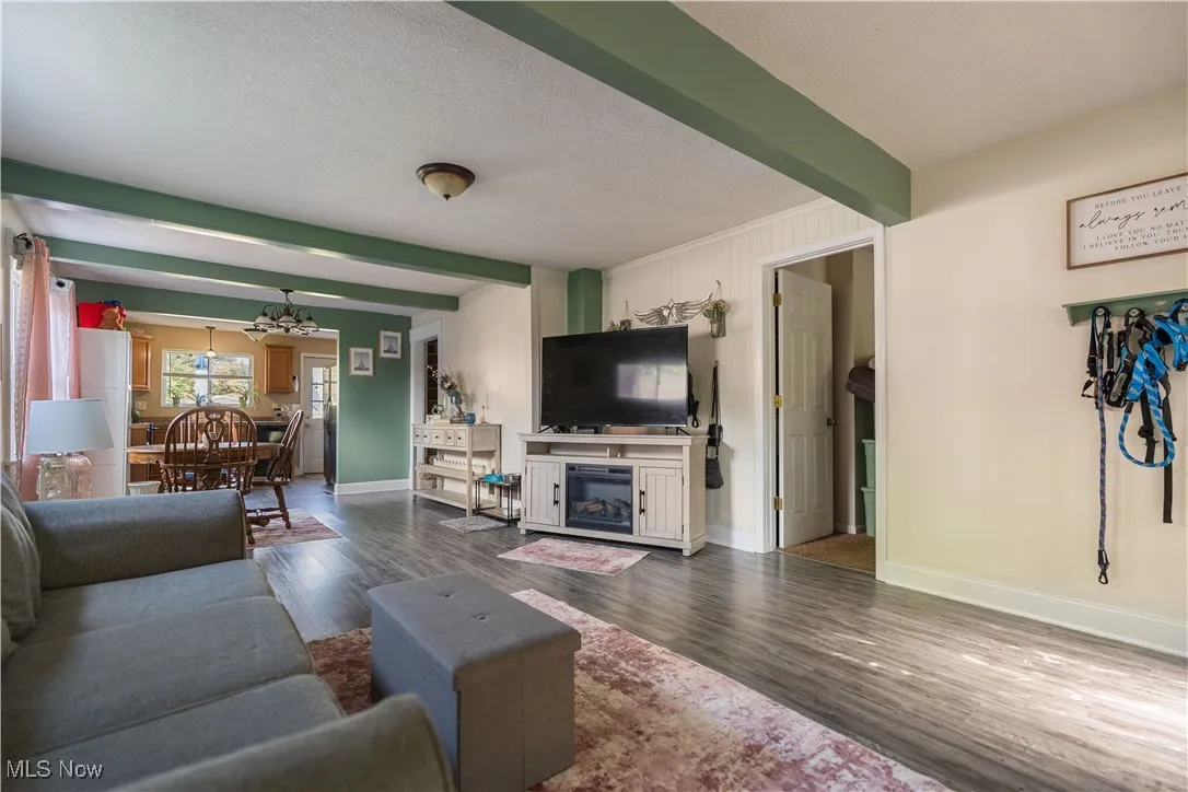 The great room flows directly in to the dining room.
