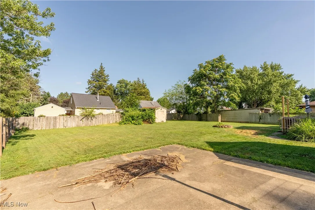 View of the fenced in back yard.