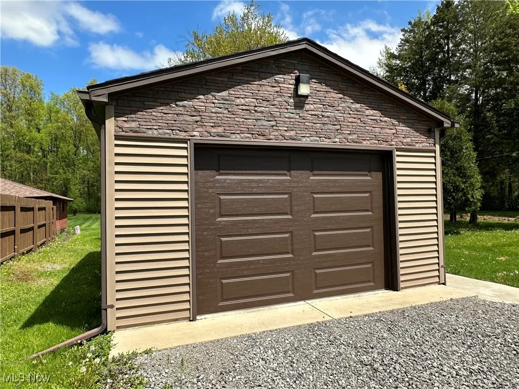 Detached NEW garage with gravel driveway