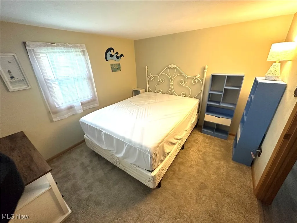 Bedroom featuring carpet flooring