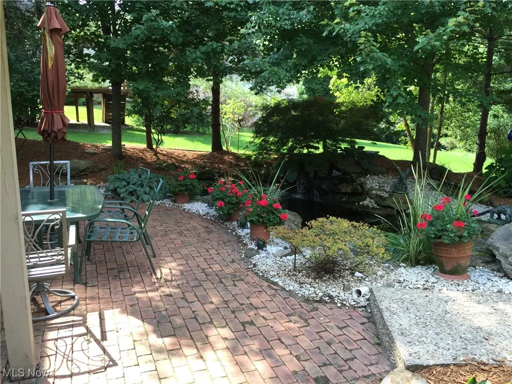 View of patio with outdoor dining space