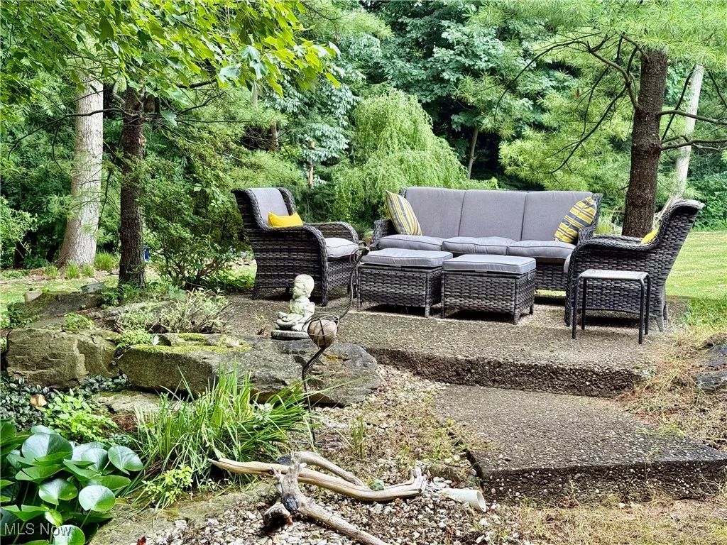 View of yard featuring an outdoor living space and a patio