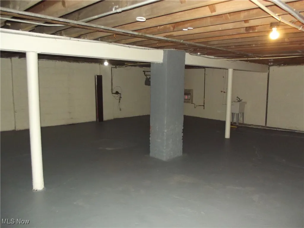 Basement featuring sink