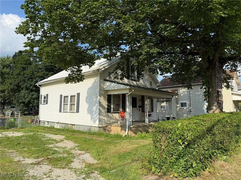 View of front of property featuring covered porch