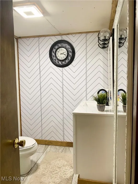 Bathroom featuring toilet and a shower