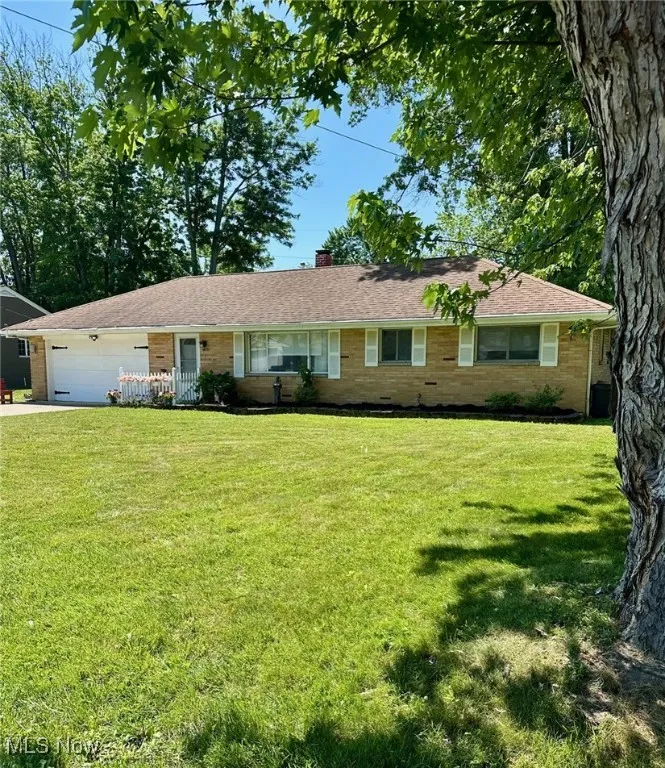 Brick ranch with 2 1/2 car attached garage