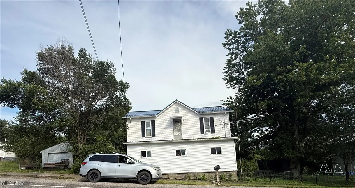 View of home's exterior with a metal roof