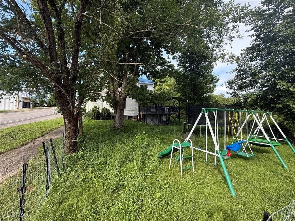 View of yard featuring a playground
