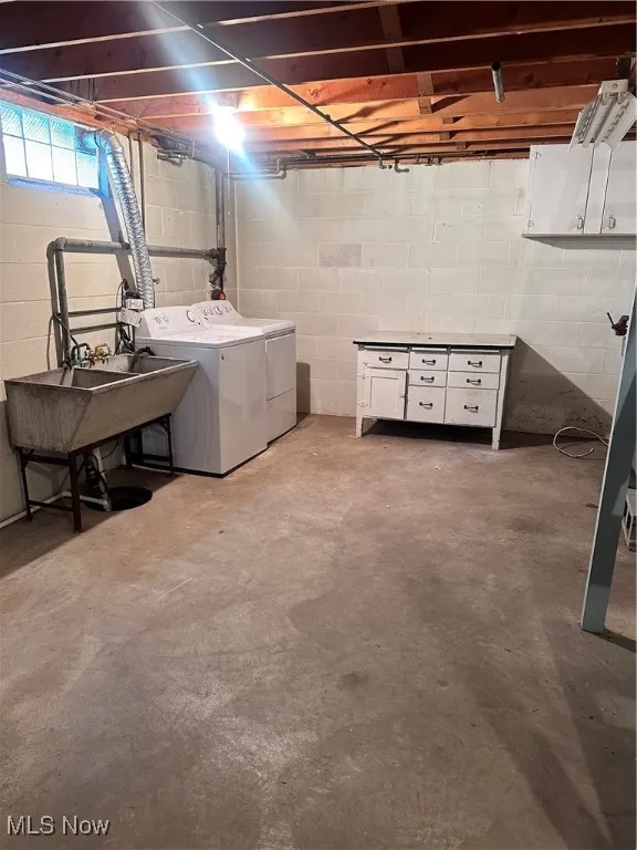 Basement featuring washing machine and dryer