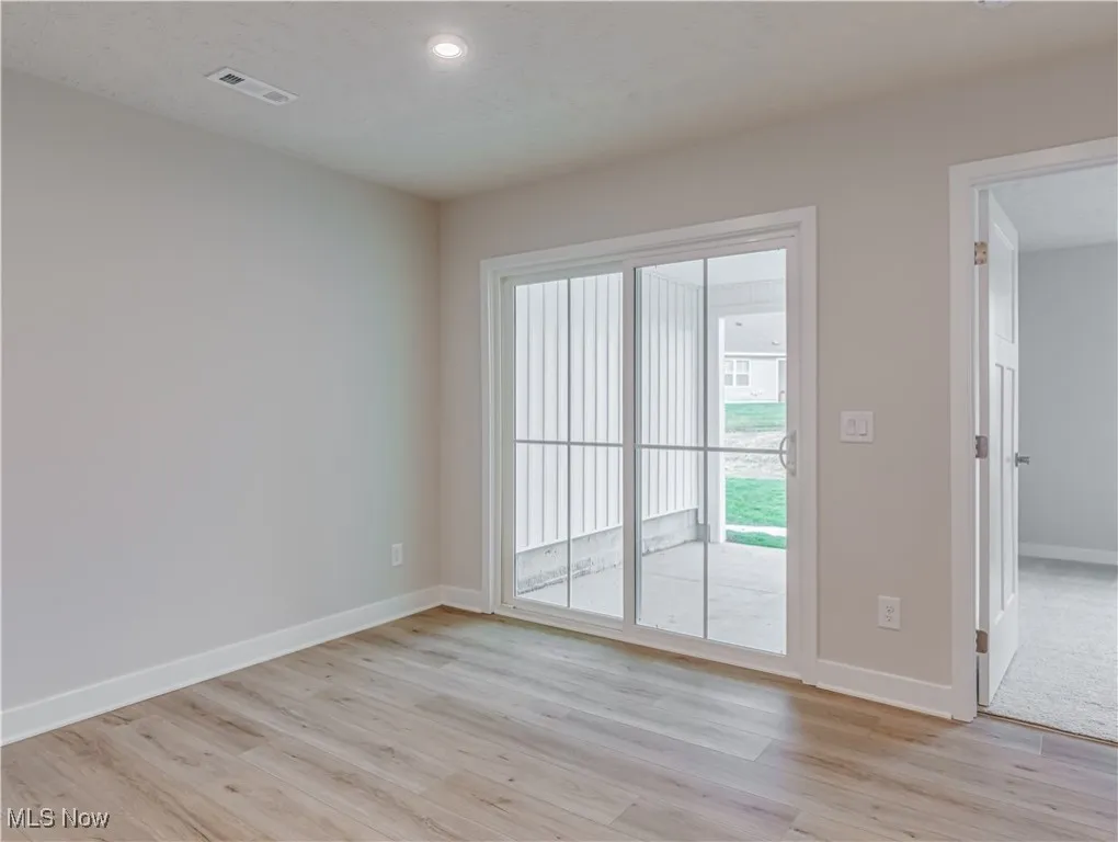 Dining area with a sliding glass door out to the patio and back yard