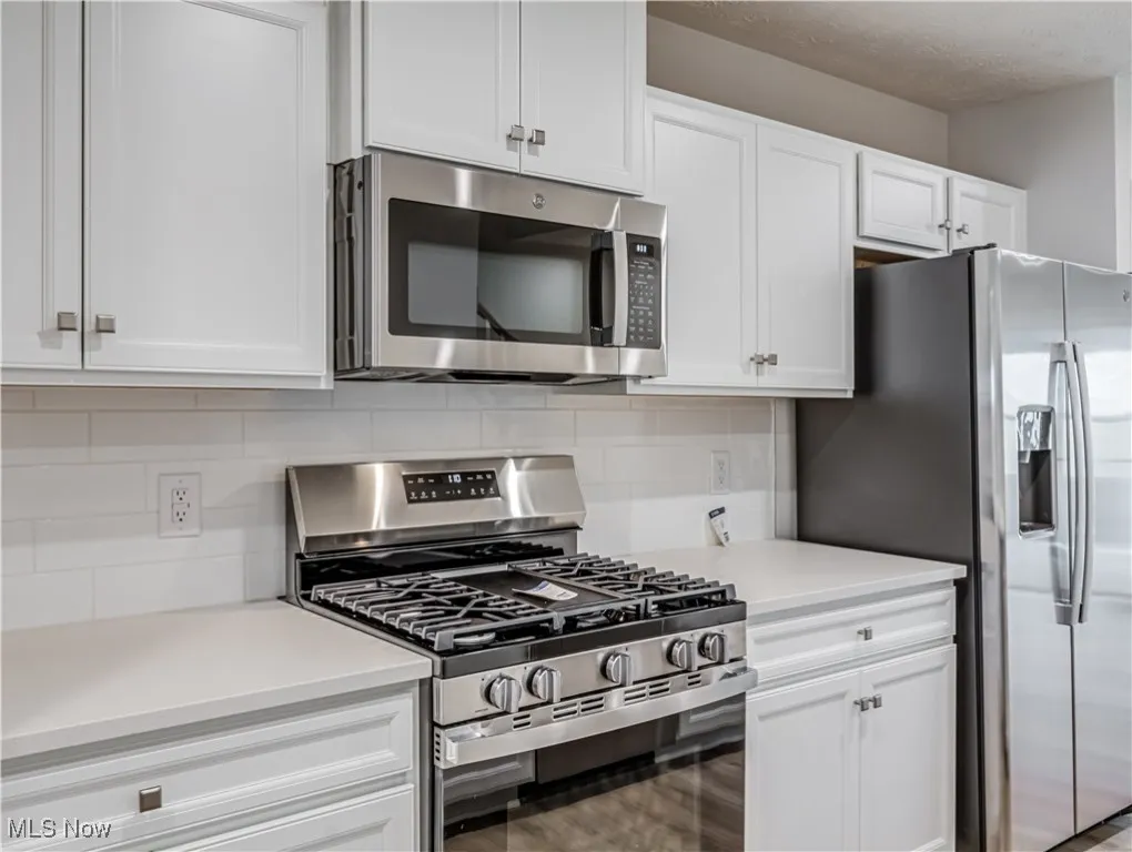 Another view of the kitchen and new appliances