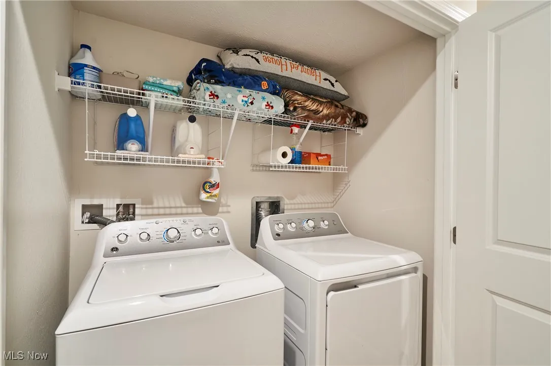 Laundry room featuring washing machine and dryer