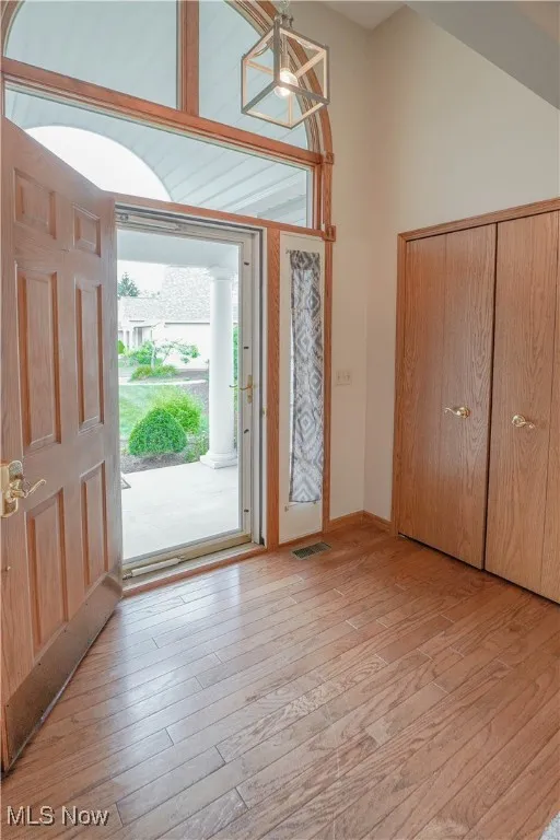 Entryway featuring light wood flooring