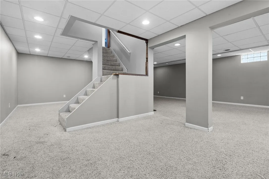 Recreation room, 27 x 26, recessed lighting, light carpeting and storage