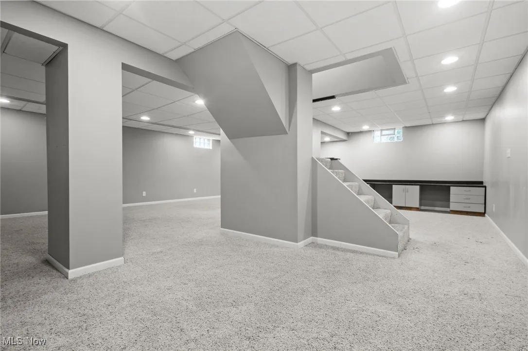 Recreation room showing the built-in cabinetry / desk