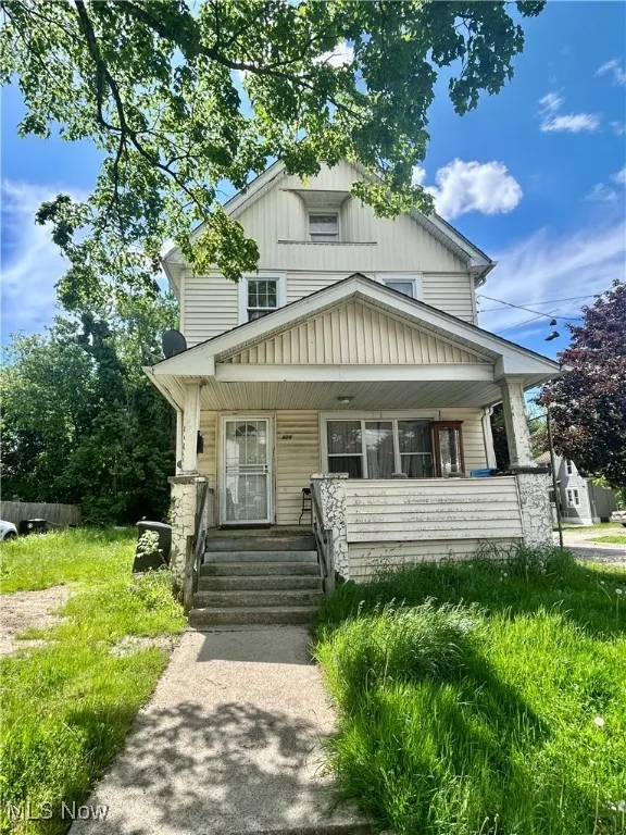 View of front of house with covered porch