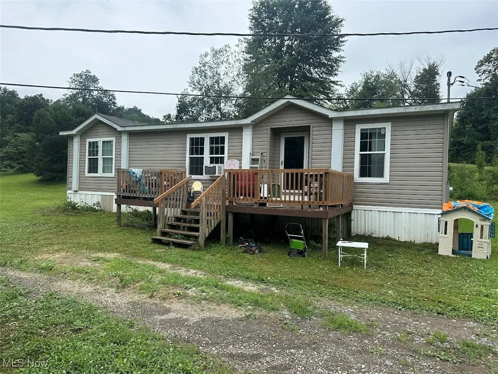 View of front of property with a deck