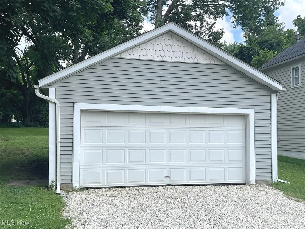 View of detached, 2 car garage