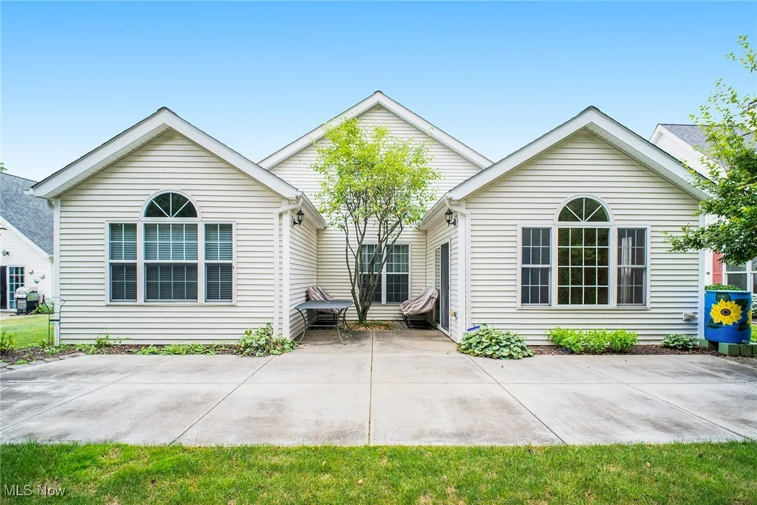 Back of property with a patio area